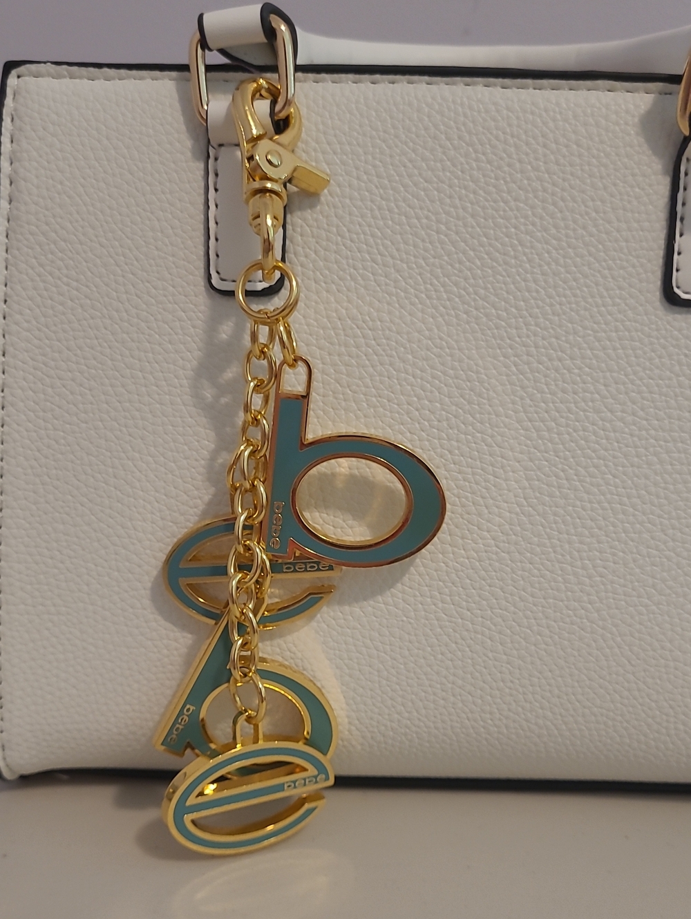 bebe Gold-tone Teal Logo Charm Keychain